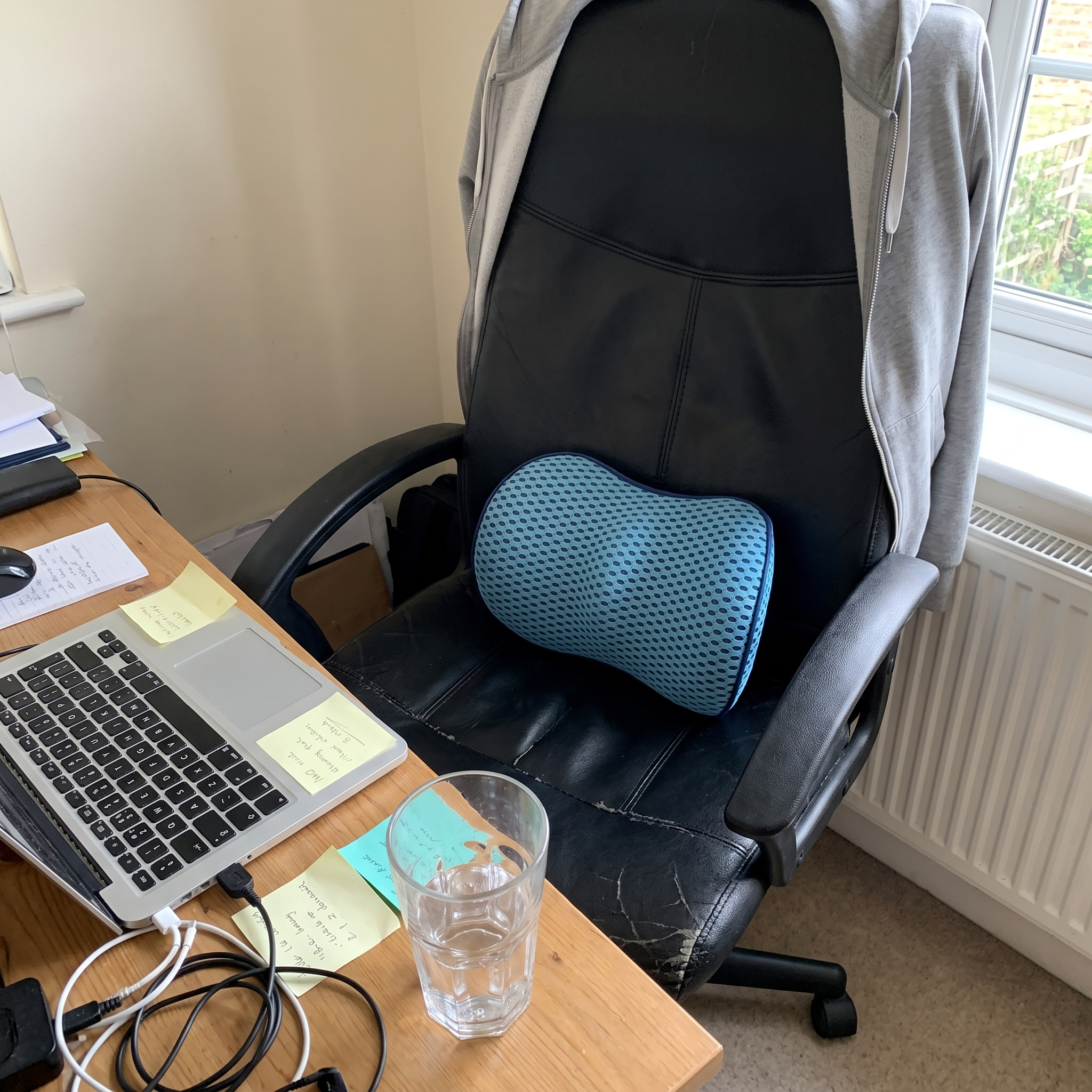 The lumbar cushion fitted to an office chair at home